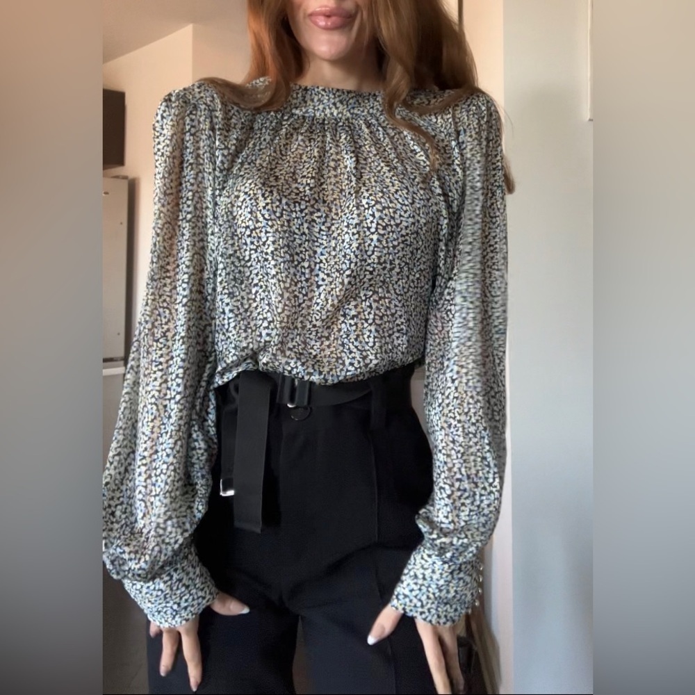 Loose high collar blouseโ